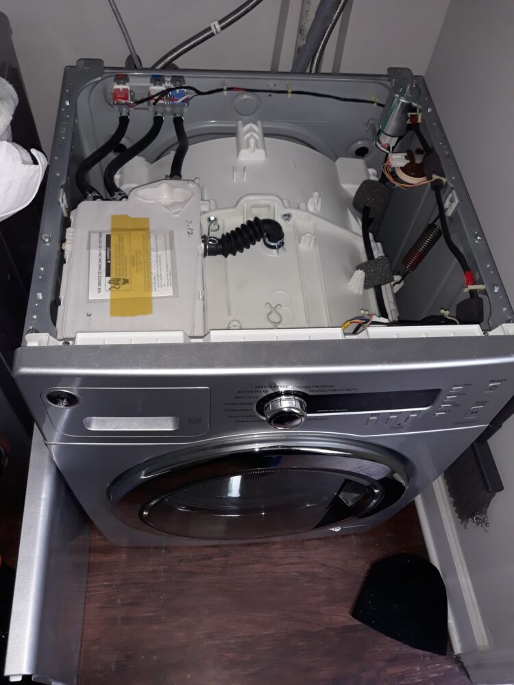 appliance repair washer repair a broken tub shaft assembly connected to the drive motor  united way southchase orlando fl 32824