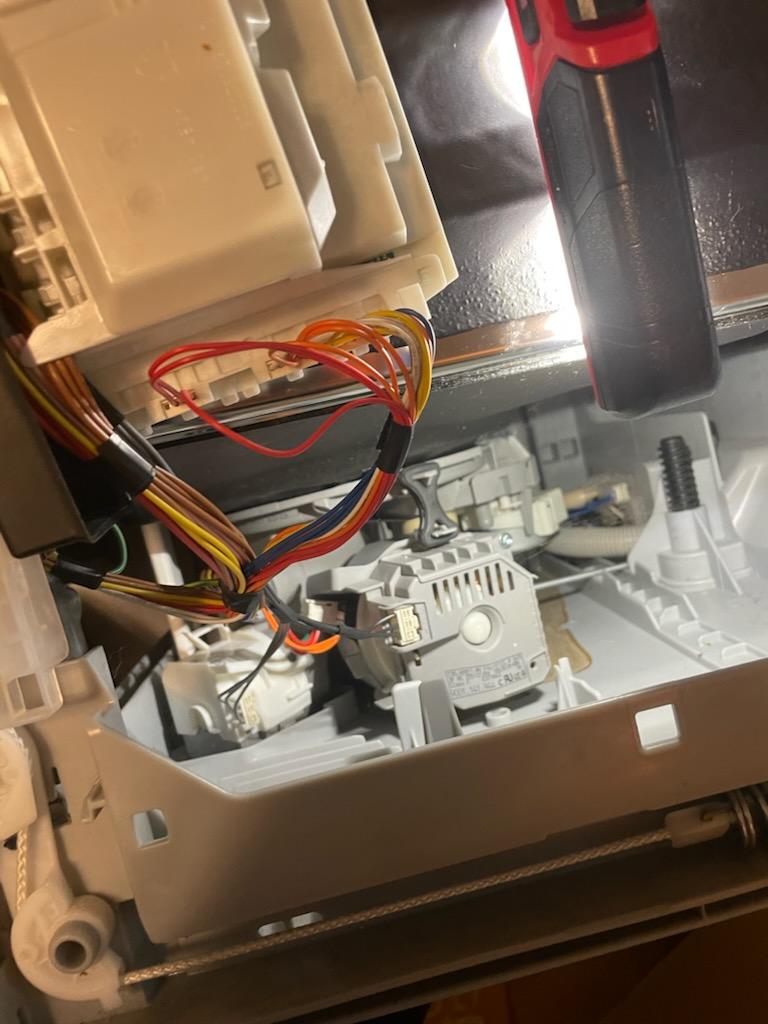appliance repair dryer repair replacement of drain pump on a Bosh dishwasher muir cir clermont fl 34711