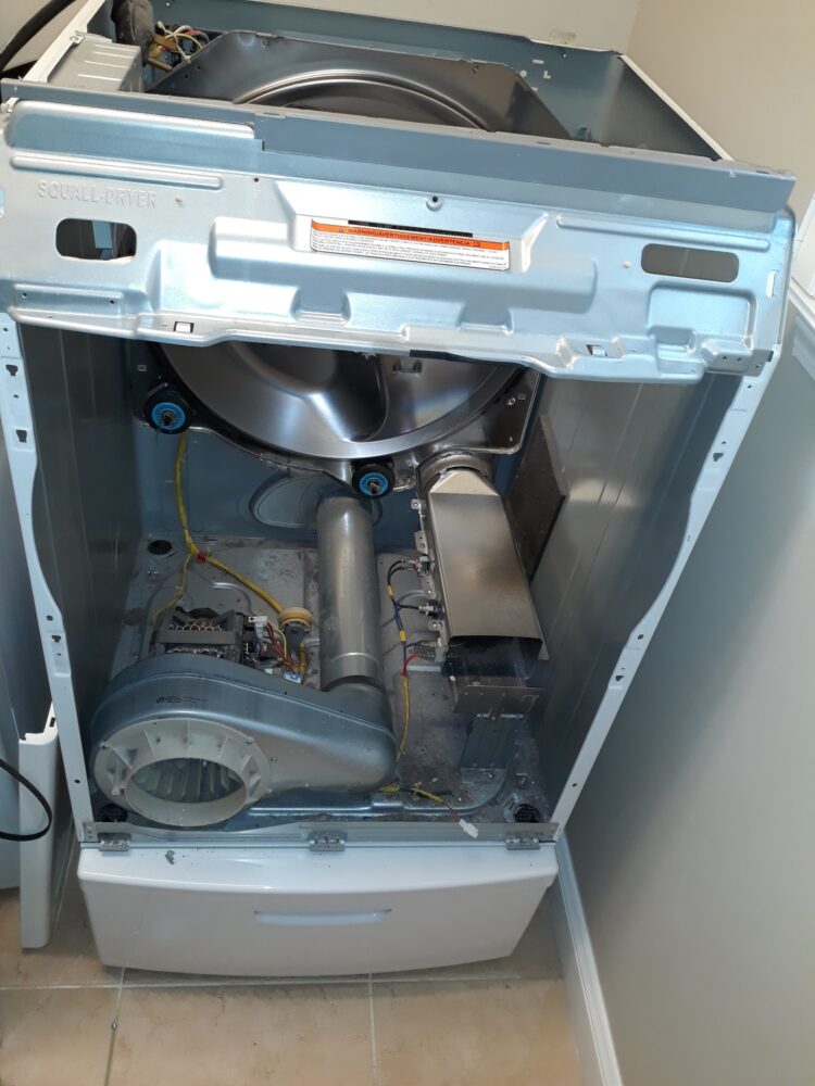 appliance repair dryer repair required replacement of the broken drum belt and idler pulley assembly flanders ave daytona beach fl 32114