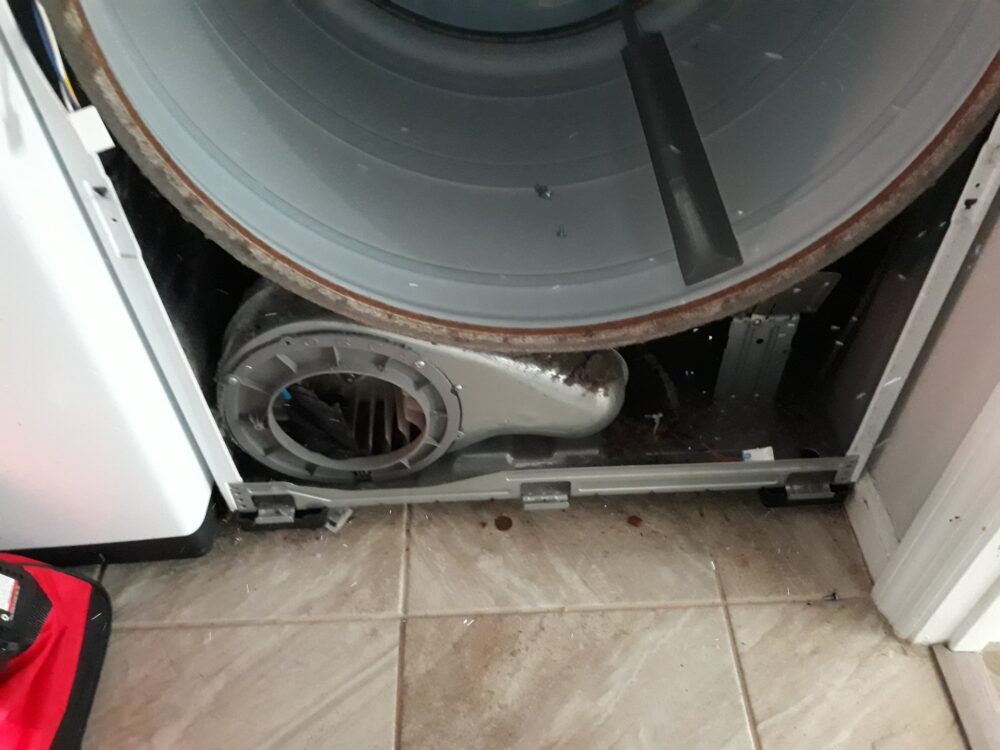 appliance repair dryer repair repair required manual dissembly to access the seize clothing caught inside the blower assembly caloosa woods ln sun city center fl 33573