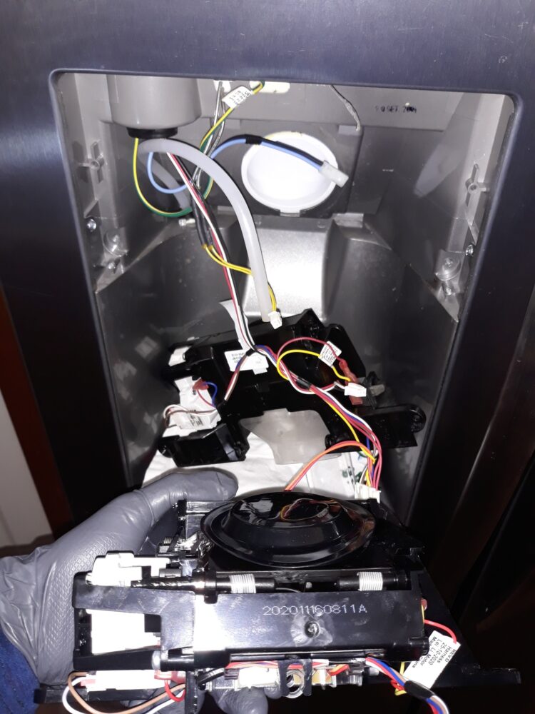 appliance repair refrigerator repair repaired by replacement of the broken dispenser module with a new part cantrell street elfers holiday fl 34690