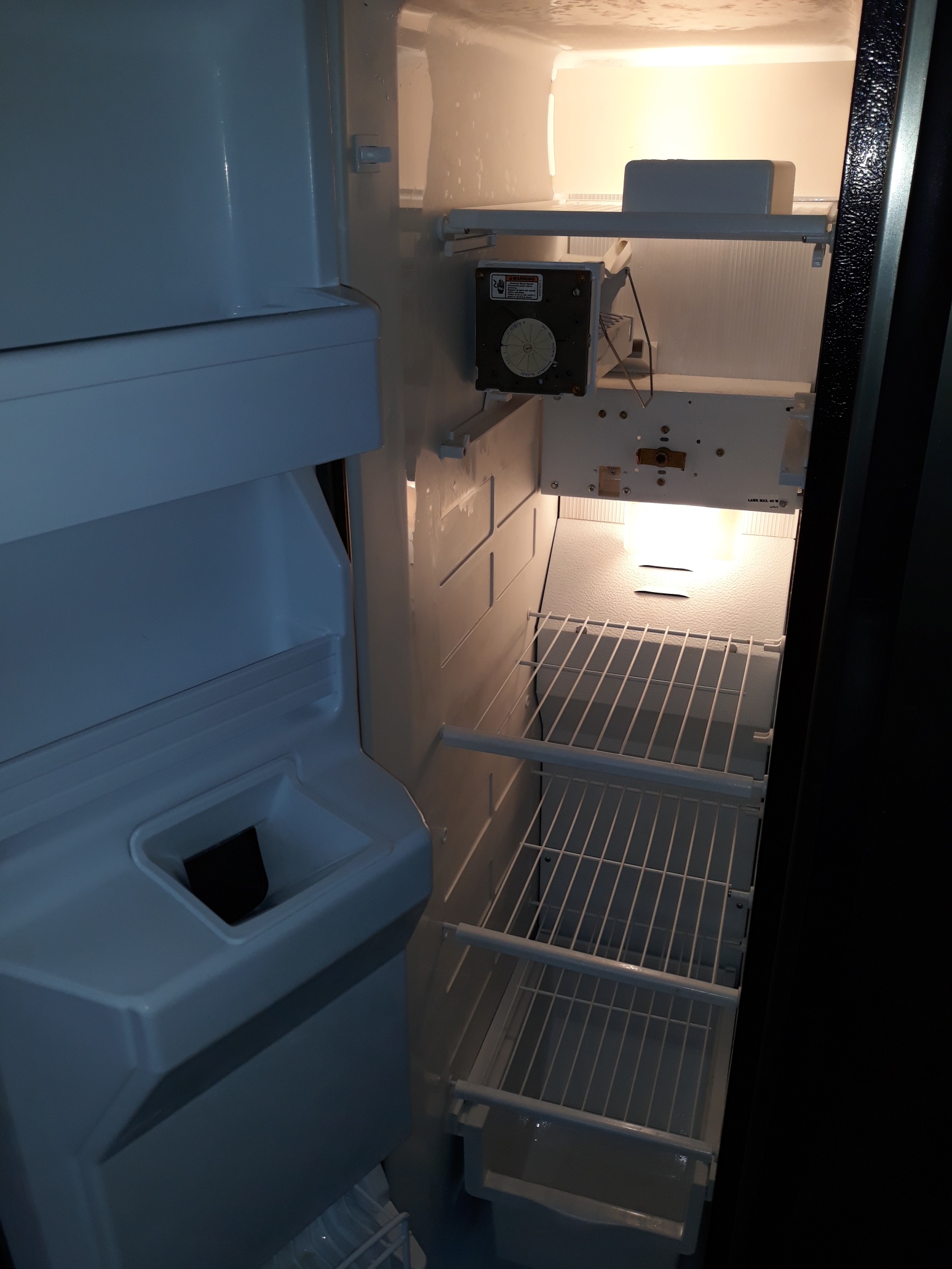 appliance repair refrigerator repair repaired by replacement of the broken ice maker assembly davenport dr the villages fl 32162