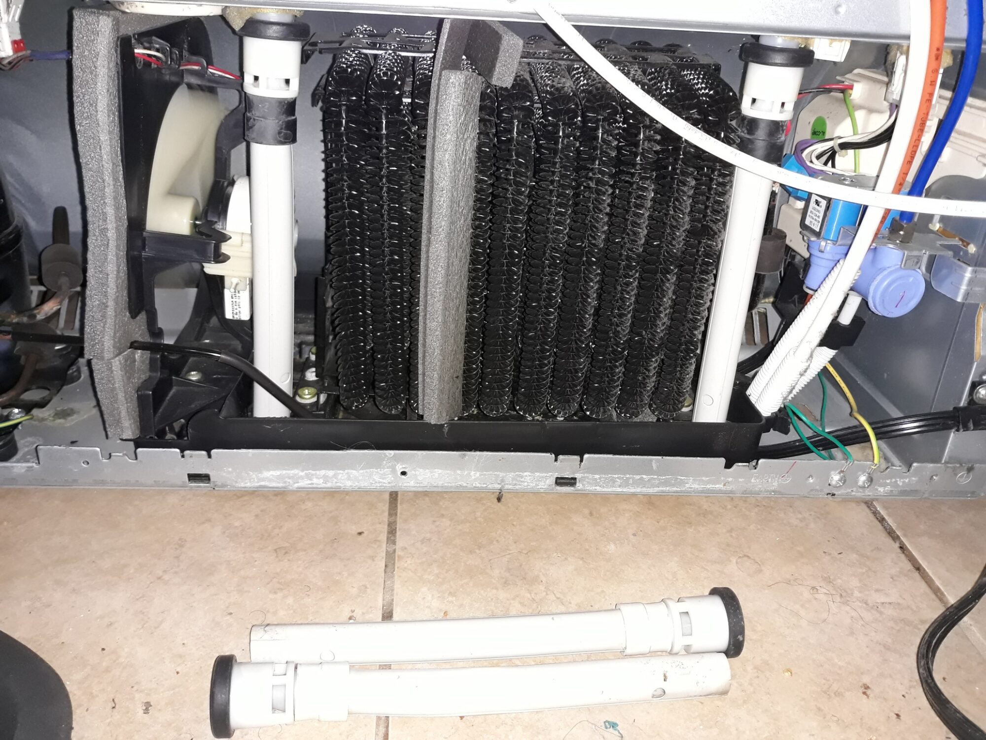 appliance repair refrigerator repair replacement of the old design drains with the new upgraded drains country road grand island eustis fl 32726